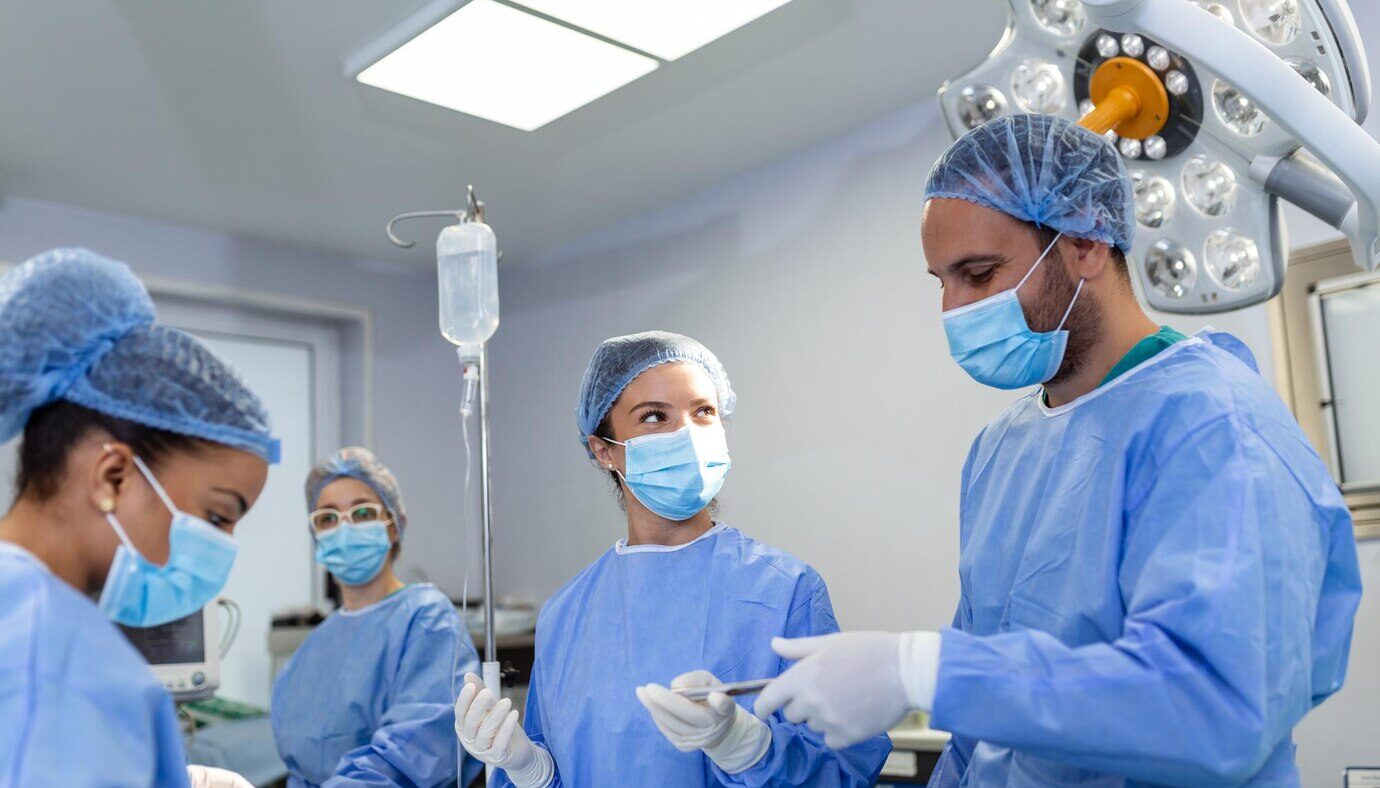 surgical-team-performing-surgery-modern-operation-theaterteam-doctors-concentrating-patient-surgeryteam-doctors-working-together-surgery-operating-room_657921-1101